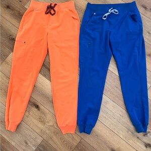 2 pair Figs Zamora medium tall women’s joggers  scrubs papaya and royal blue